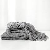 Snug Knit Woven Tassel Blanket