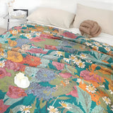Couverture à pampilles en patchwork floral bohème