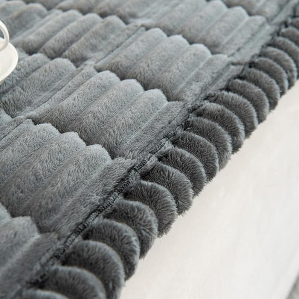 Housse de canapé à bords plissés en peluche